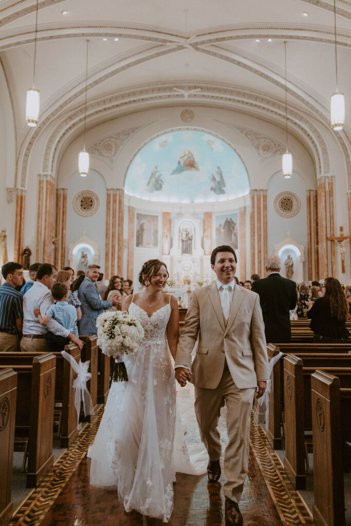 couple after their catholic wedding ceremony