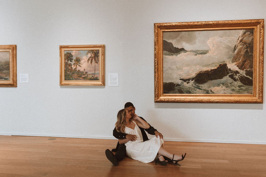 couple posing in an art museum for a couples photoshoot in Orlando - art museum photoshoot | Vintage Style Art Museum Photoshoot in Orlando