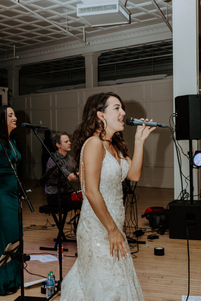 bride singing during her wedding