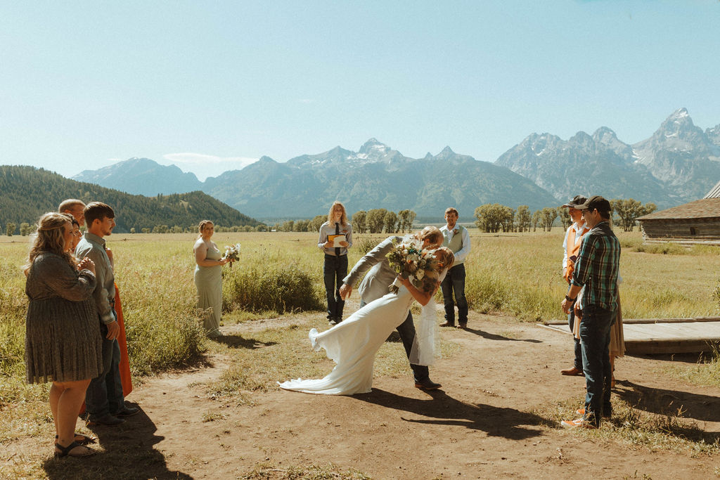 newlyweds posing in grand teton after their wedding for their wedding portraits | Majestic Grand Tetons Elopement Day

