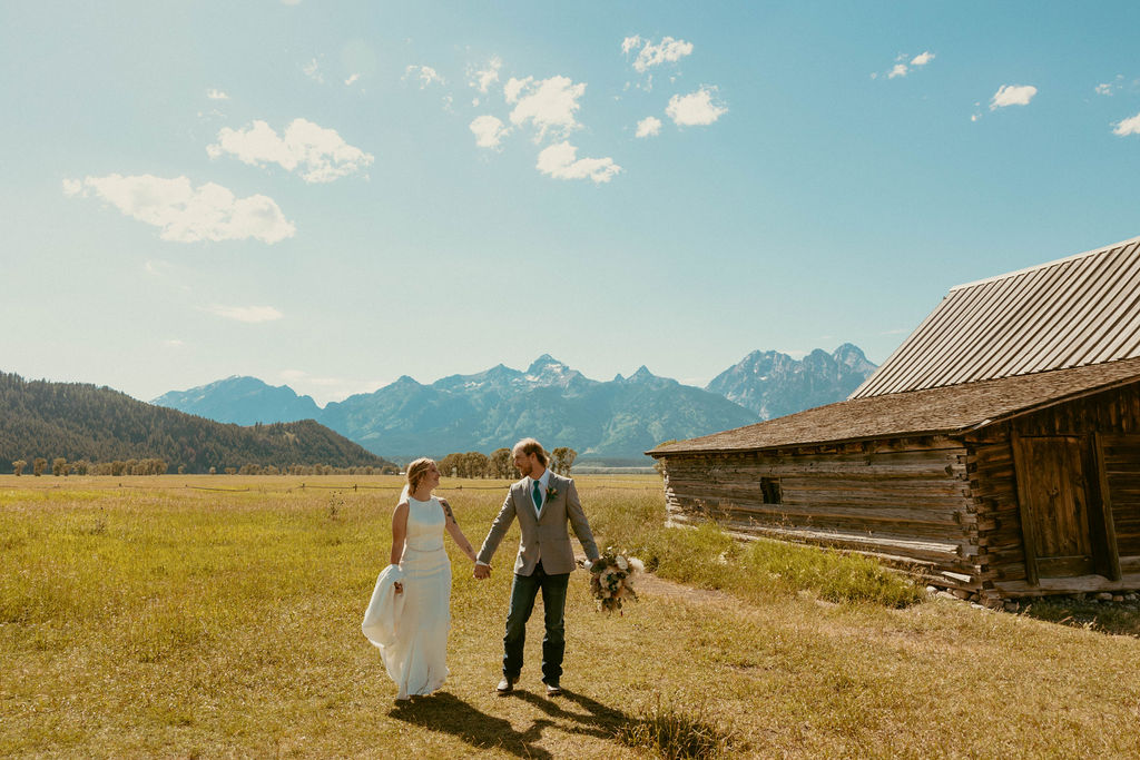bride and groom posing after their elopement for their couples portraits - ruthie isaacson photography - Majestic Grand Tetons Elopement Day