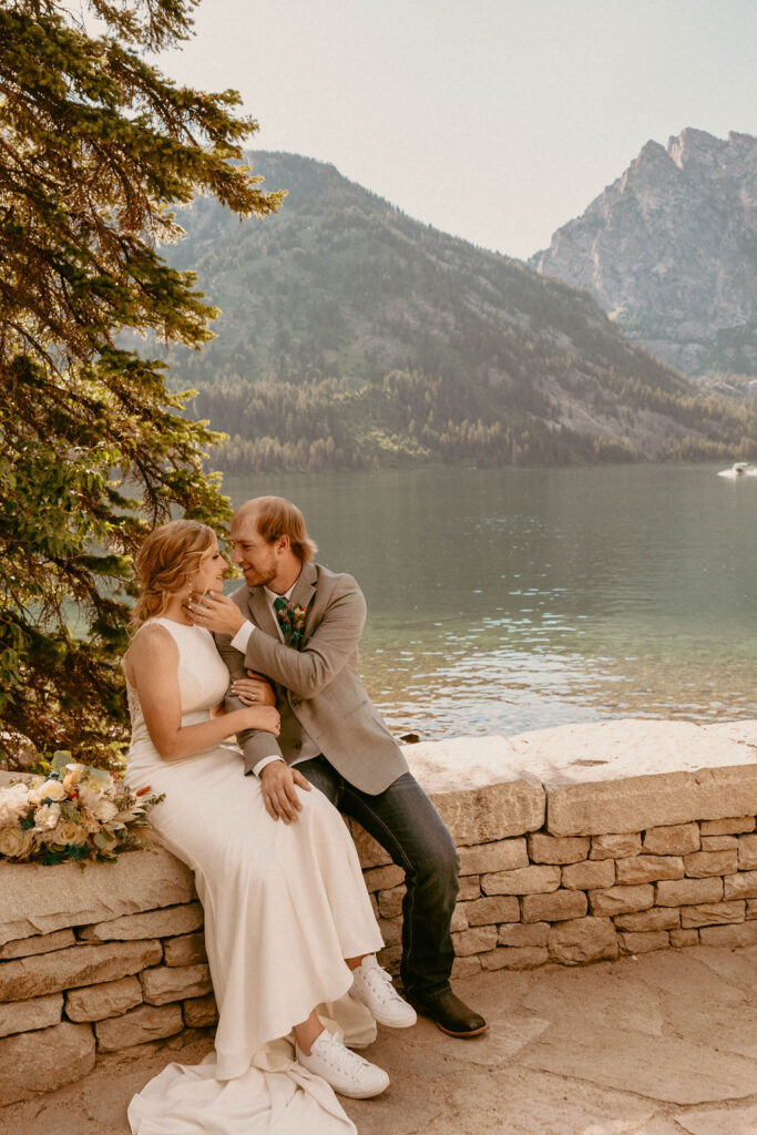couple posing outdoors for their elopement photos - grand tetons elopement
