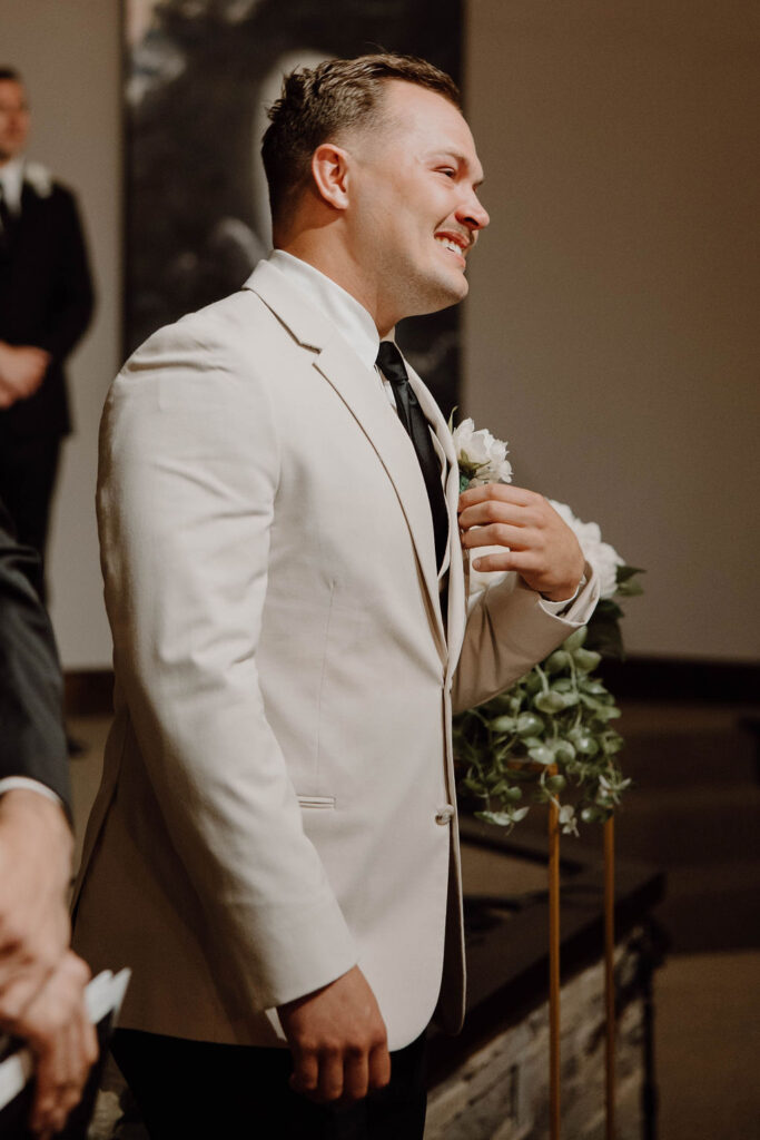 groom standing at the altar 
