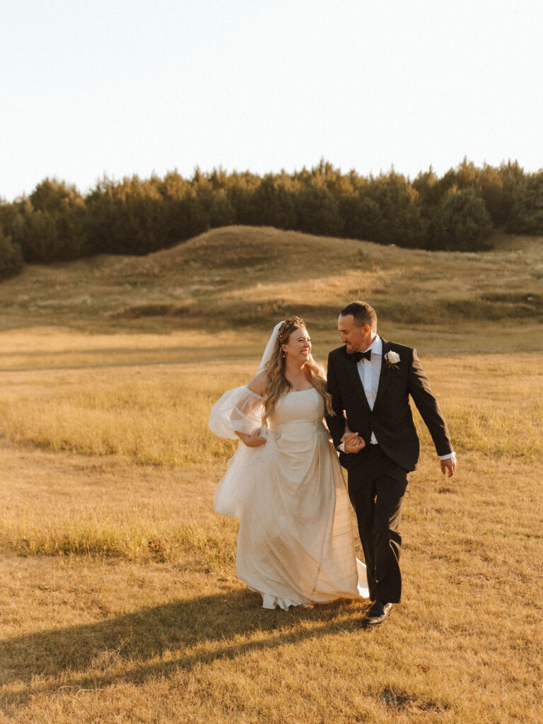 couple posing for wedding photos | A Bohemian + Intentional Walnut Grove Wedding In Nebraska